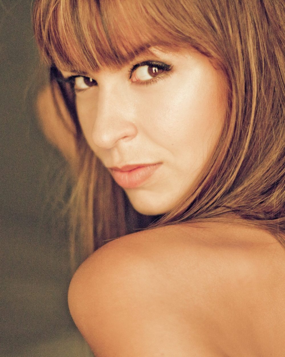 Fotografía de Stephanie en close up desde detrás del hombro